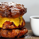 Illustration for article titled Breakfast burger replaces bread with freshly glazed apple fritters